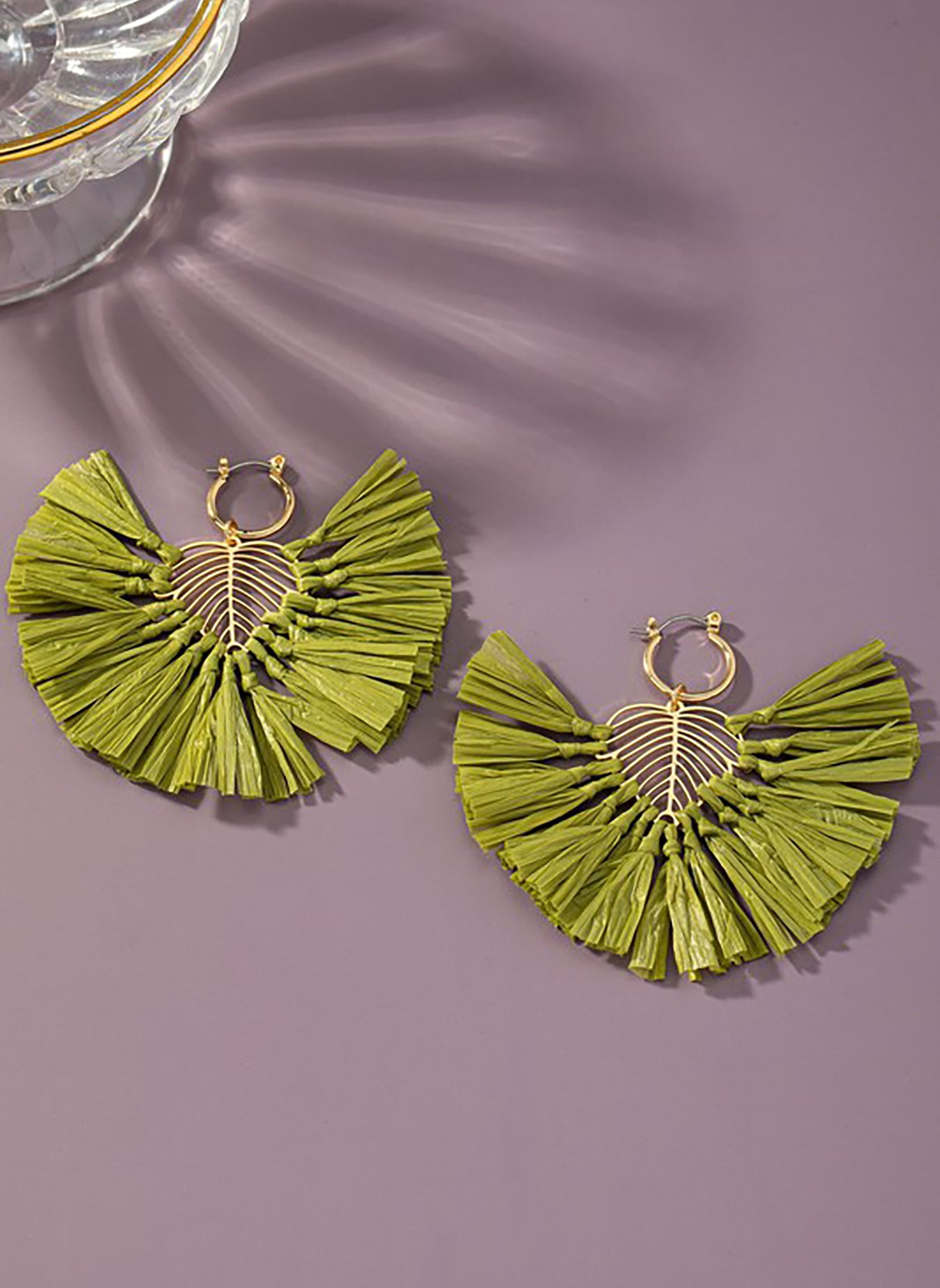 Statement earrings with raffia straw leaf drop