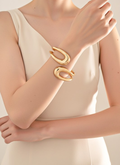 Sculptural open-form gold bangle